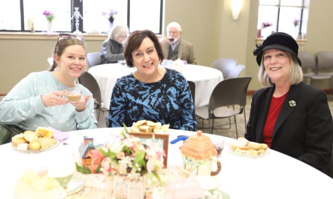 (From left to right) Amelia Hopper, Nancy Lugo-Baez and her sister Ann McClaflin enjoy High Tea.