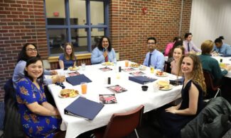 Students attend the 2023 prayer breakfast at Newman University.