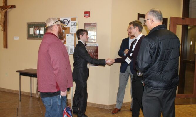 Students meet and mingle with fellow interviewees during Scholarship Interview Day at Newman.