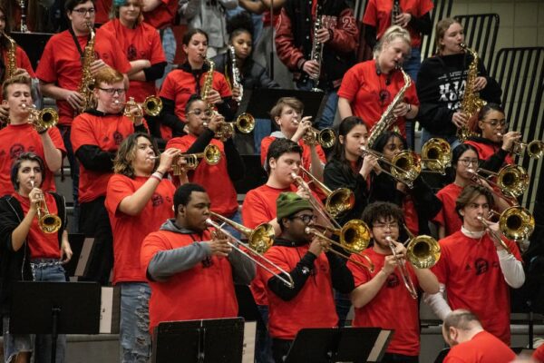 The Wichita Heights High School band performed throughout the men and women's basketball games at Newman homecoming.