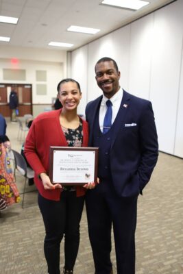 Breanna Brown, pictured with Councilman Brandon Johnson, won the 2023 student Martin Luther King Jr. Distinguished Service Award.