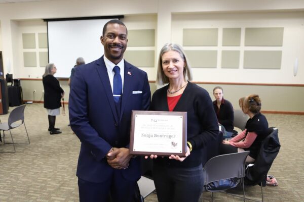 Sonja Bontrager, pictured with Councilman Johnson, won the 2023 staff/ faculty Martin Luther King Jr. Distinguished Service Award.