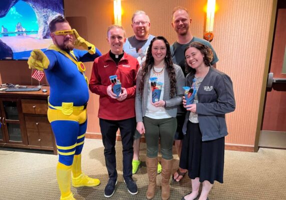 Even without a Bat-Signal or capes, many Newman University supporters answered the call to “Be A Hero” during the fourth annual Giving Day fundraiser Feb. 28.