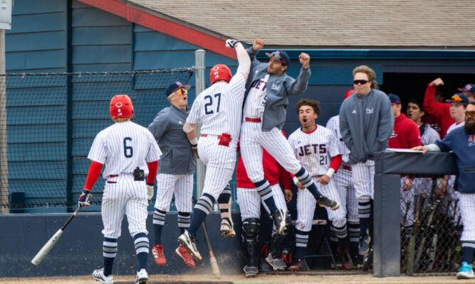 Players of the Newman baseball team celebrate during a game. (Courtesy photo Richard Rico)