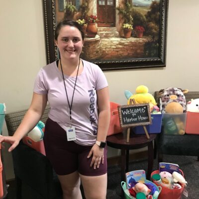 Senior Marissa Freshour organized gift baskets with essentials and children’s toys for families who enter the Catholic Charities Harbor House. (Courtesy photo)