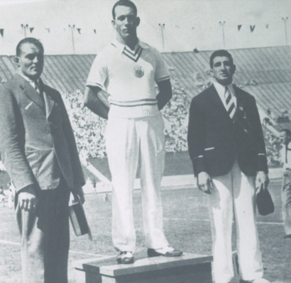 (Center) Pete Mehringer won a gold medal at the 1932 Olympic Games as a sophomore student, becoming the first Kansas University athlete to ever win an Olympic gold medal. (Courtesy photo)