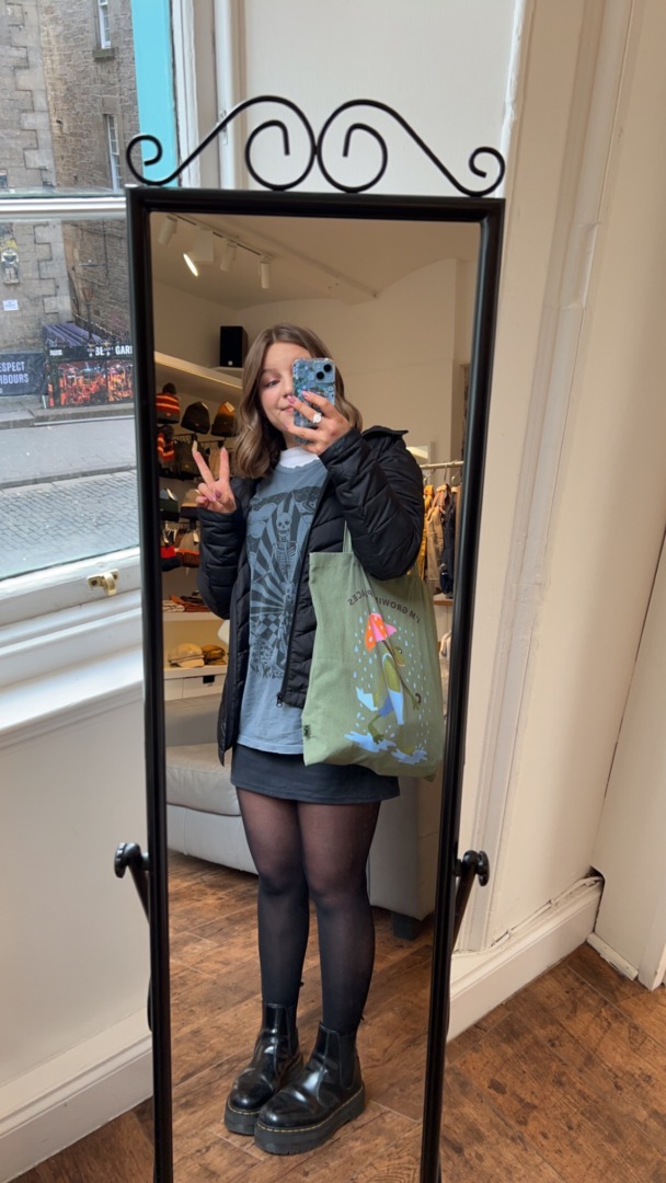 Pachta's caption: "My tote bag that I bought here, the frog is holding an umbrella and says 'I’m Growing Places.' HOW CUTE!" (Courtesy photo)