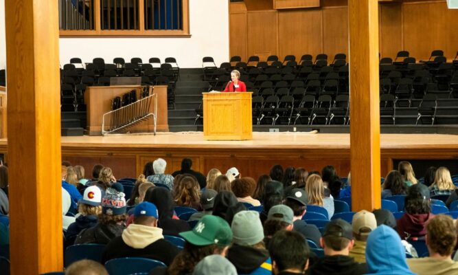 Newman Director of Athletics Joanna Pryor addresses attendees of the Women's Career Conference on March 7. (Courtesy of Jim Turner Photography)