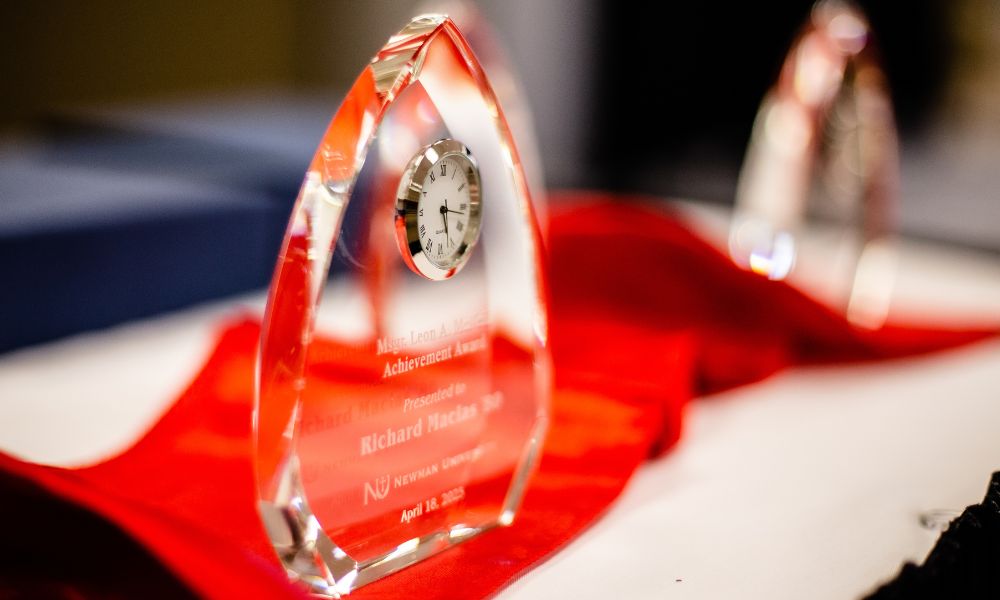 A glass award from the Alumni Awards, Beata Benefactors Banquet