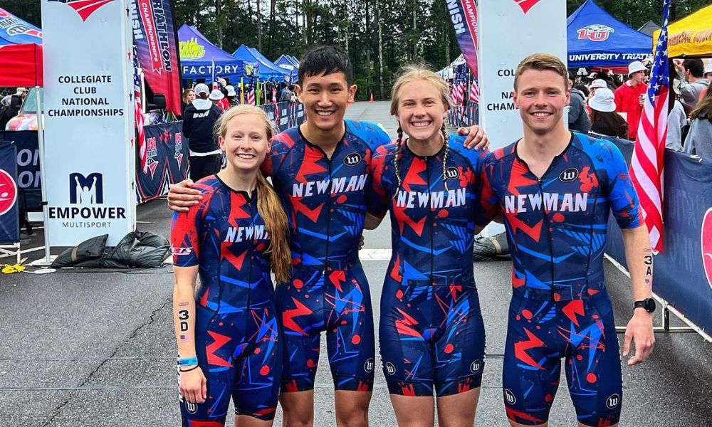 (From left to right) Newman triathletes Anna Corbett, Andrew Nguyen, Maggie Koenig and Asher Brown smile for a photo before their relay at the USA Triathlon National Championships.