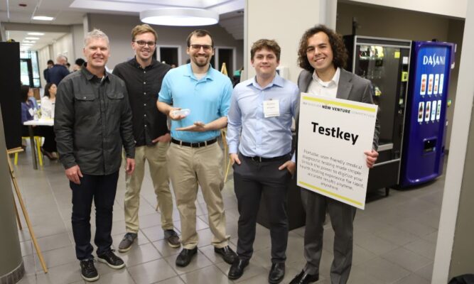 (From left to right) Faculty adviser Jeremy Patterson, Jared Goering, Christian Kindel Ben Gorman and Vasilescu.