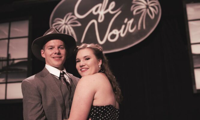 Schwartz and fiance Rebekah Lipinski performed in "Murder at Cafe Noir."