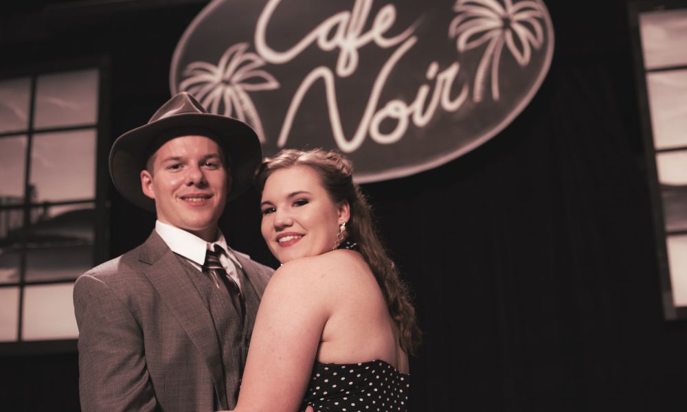 Schwartz and fiance Rebecca Lipinski performed in "Murder at Cafe Noir."