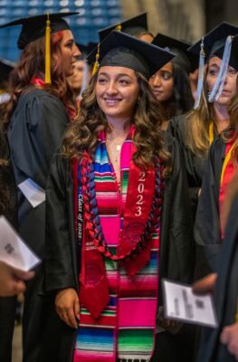 Alexis Diaz wears her academic regalia on Newman commencement day, May 12.