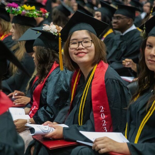Emily Hua smiles on graduation day.