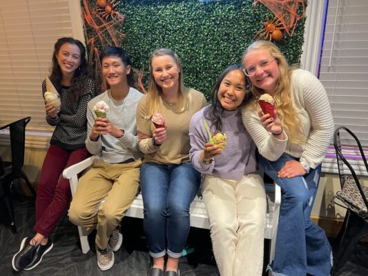 (Left to right) Eliana Gaytan, Andrew Nguyen, Elise Helfrich, Felisa Sajulga and Reiley Bartel pose for a photo while eating ice cream. 