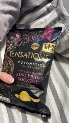 "Shout out to Jasmin for this picture of king prawn-flavored Coronation Crisps," Pachta said. 