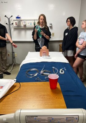 Stacie Fox, assistant professor and director of clinical education for respiratory care,  teaches students about respiratory care.