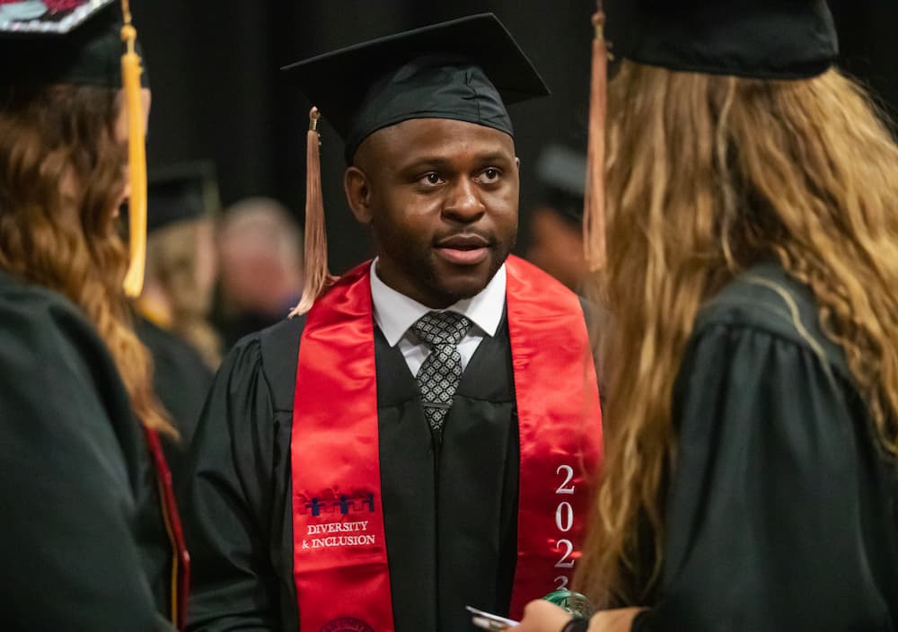 Mendel Folefac '23 served as a graduate assistant, director of residence life and earned his MBA from Newman University.