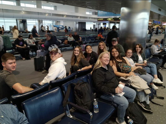 n the Denver Airport, about to fly to London!
From left to right, back row to front: Kenneth Huie, Cole Farquhar, Britlynn Lukens (might be Traugott instead, I'm not sure), Angelica Rodriguez, Cassandra Moeder, Joshua Dessenberger, Dr. Jill Fort, Iveth DeLoera, Hadassah Umbarger, and Emily Maddux