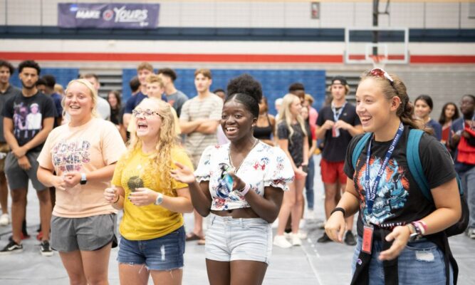 Newman students smile during the 2022 orientation days.