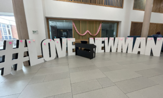 Newman University sign in lobby