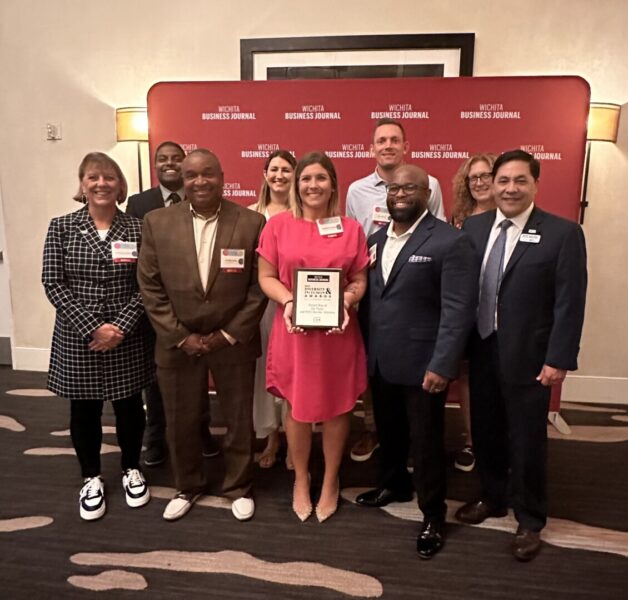 Heather Crump (center) and her team accept a Diversity and Inclusion Award from the Wichita Business Journal for United Way of the Plains' efforts. (Courtesy photo)