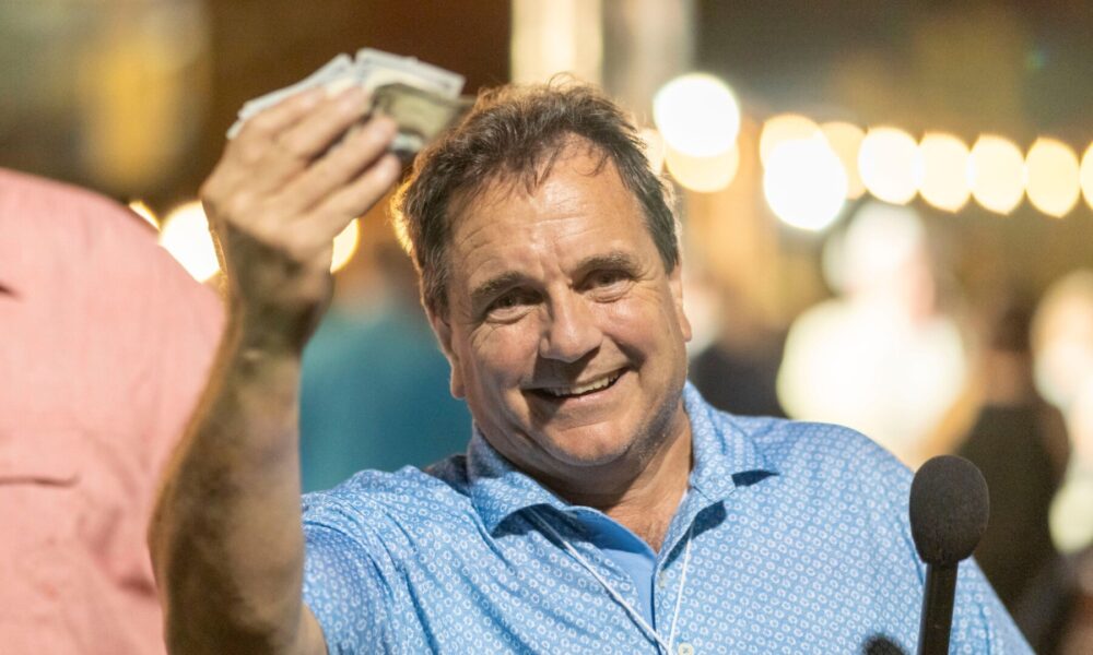 Tom Davis didn't expect to win $500 at the Party on the Plaza: Roaring 20's event. 