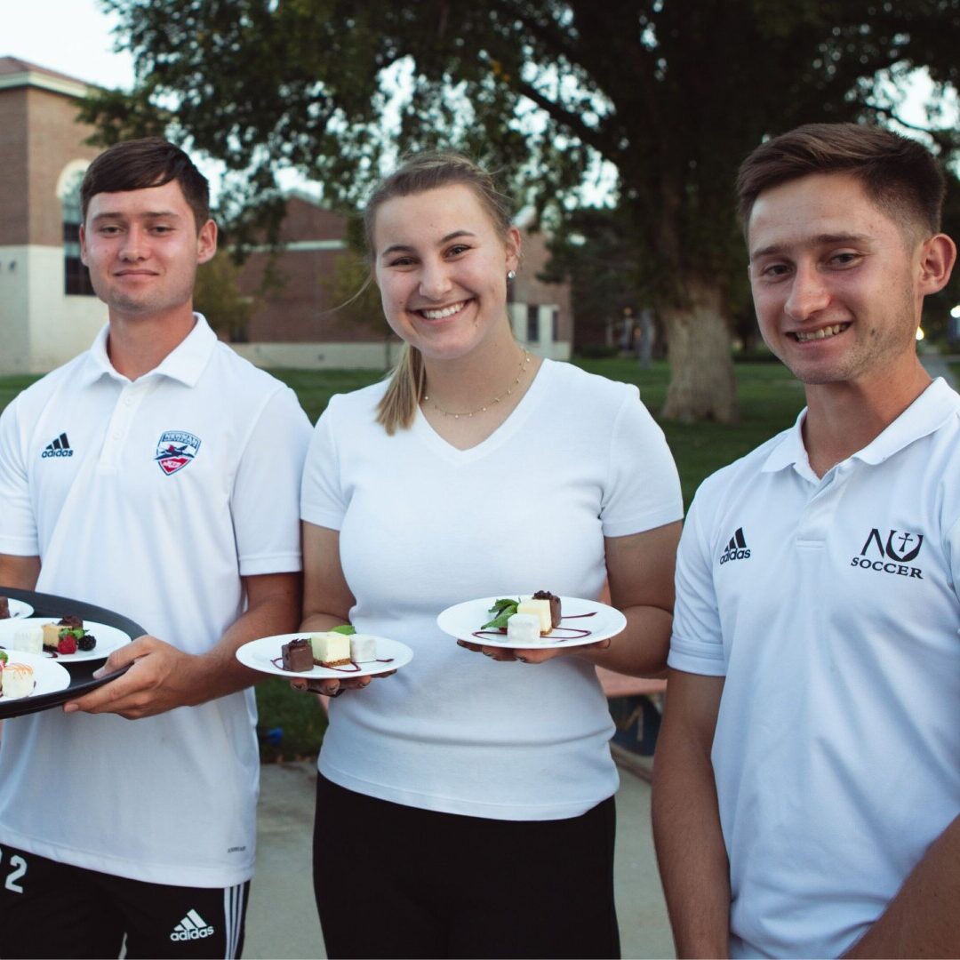 Student volunteers served desserts for the glamorous guests.
