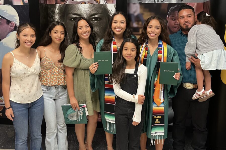 Castillo-Lopez's family gathers to celebrate the three family graduates.