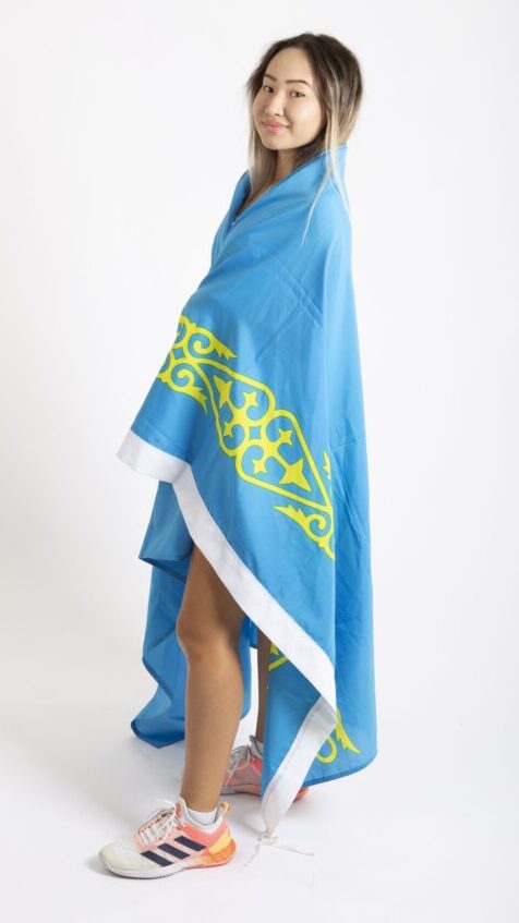 Issabayeva wears the flag of Kazakhstan, her home country.
