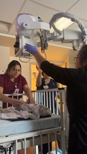Nurses work with baby Noah in the NICU. (Courtesy photo)