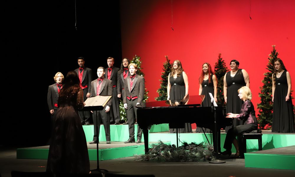 The Newman chorale and troubadours performed during their annual Christmas concert in the Performance Hall.