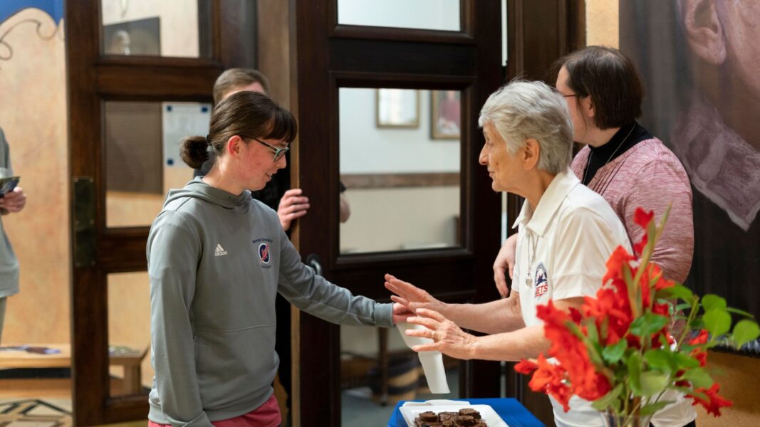 ASC Sisters interact with students outside of St. John's Chapel following ASC Foundation Day Mass.
