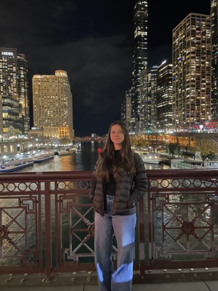 Sweitzer poses with the amazing Chicago views behind her. 