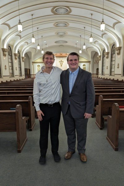 Fullerton and Green pose for a photo in St. John's Chapel after entering the church. 
