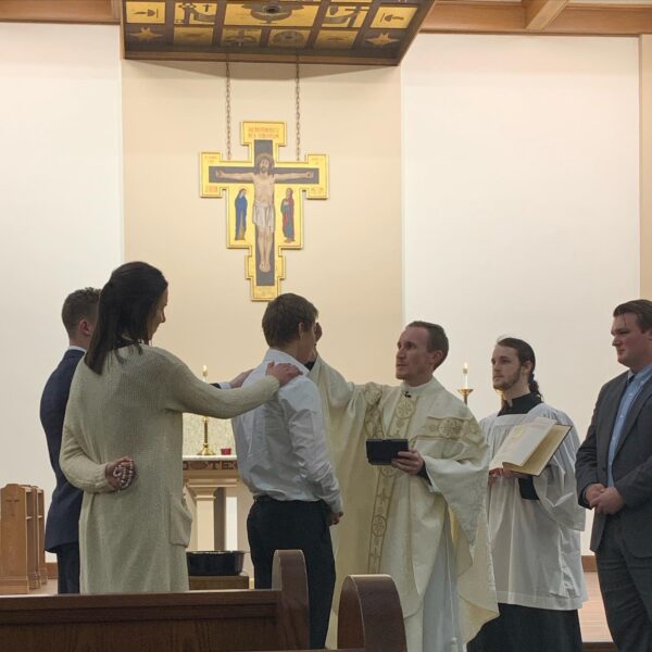 Fullerton was confirmed by Father Adam Grelinger, Chaplain and Director of Campus Ministries. 