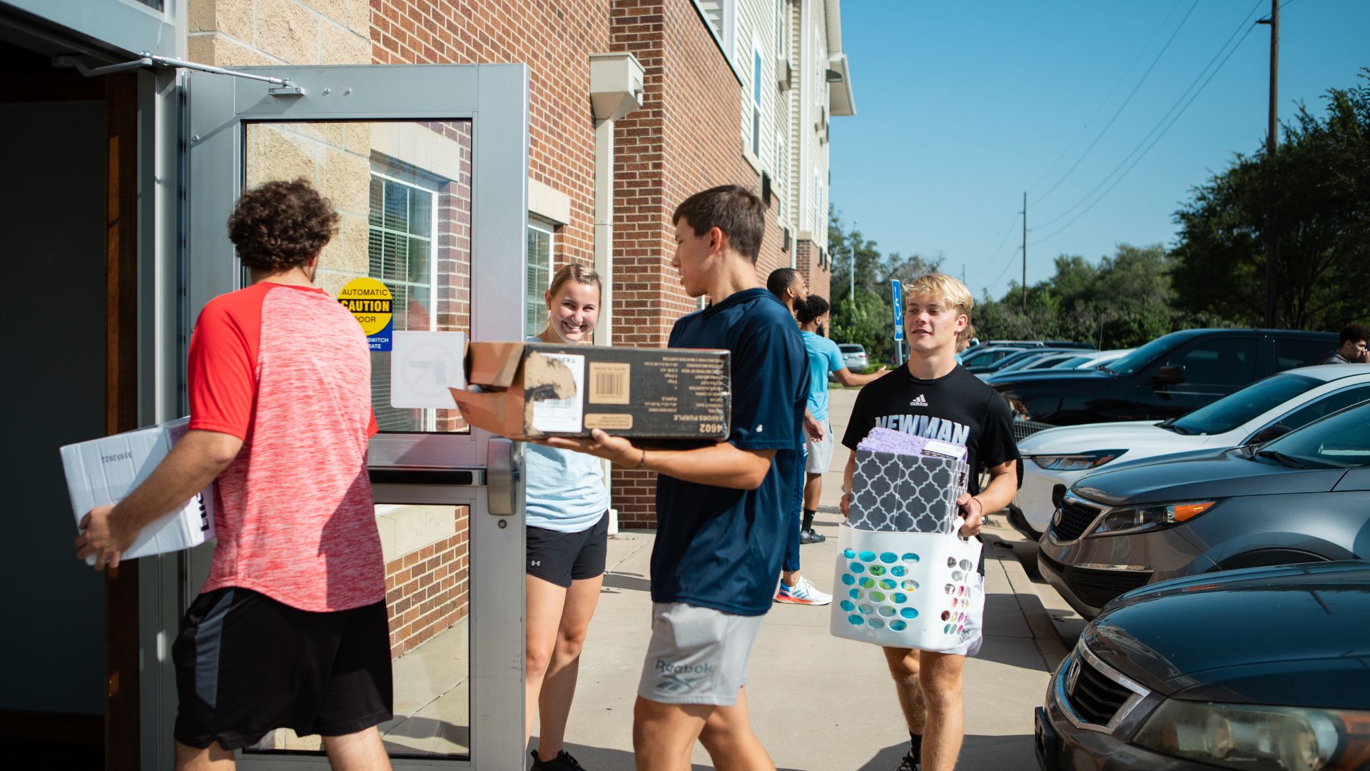 Newman University students move into the residence halls.