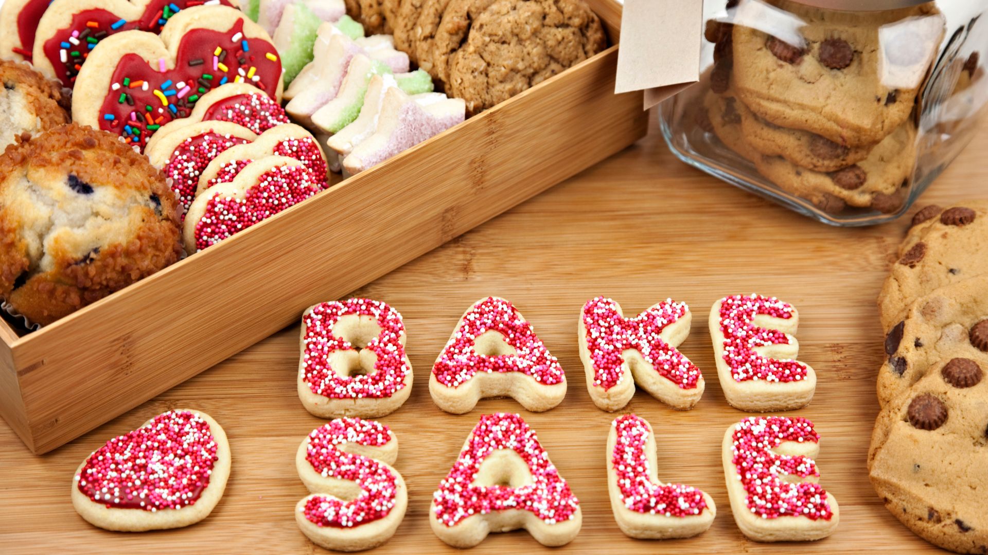 Cookies spell out the words "bake sale"