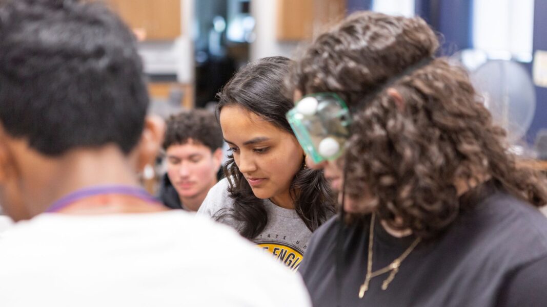 Students engage with a lab experiment in the Bishop Gerber Science Center.