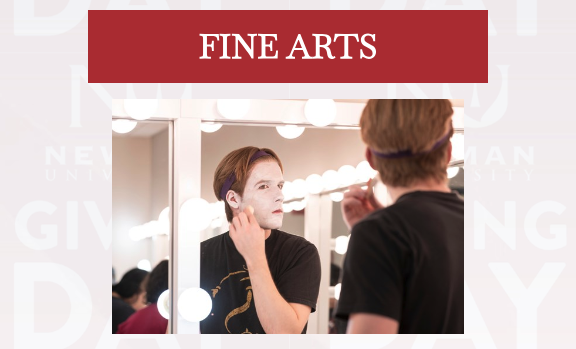 A student applies costume makeup in front of the theater mirrors at Newman University.