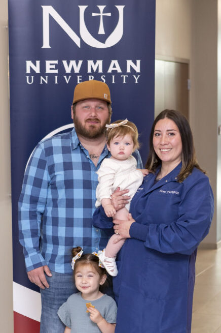 Turnquist and family members at the Newman University labcoat ceremony.