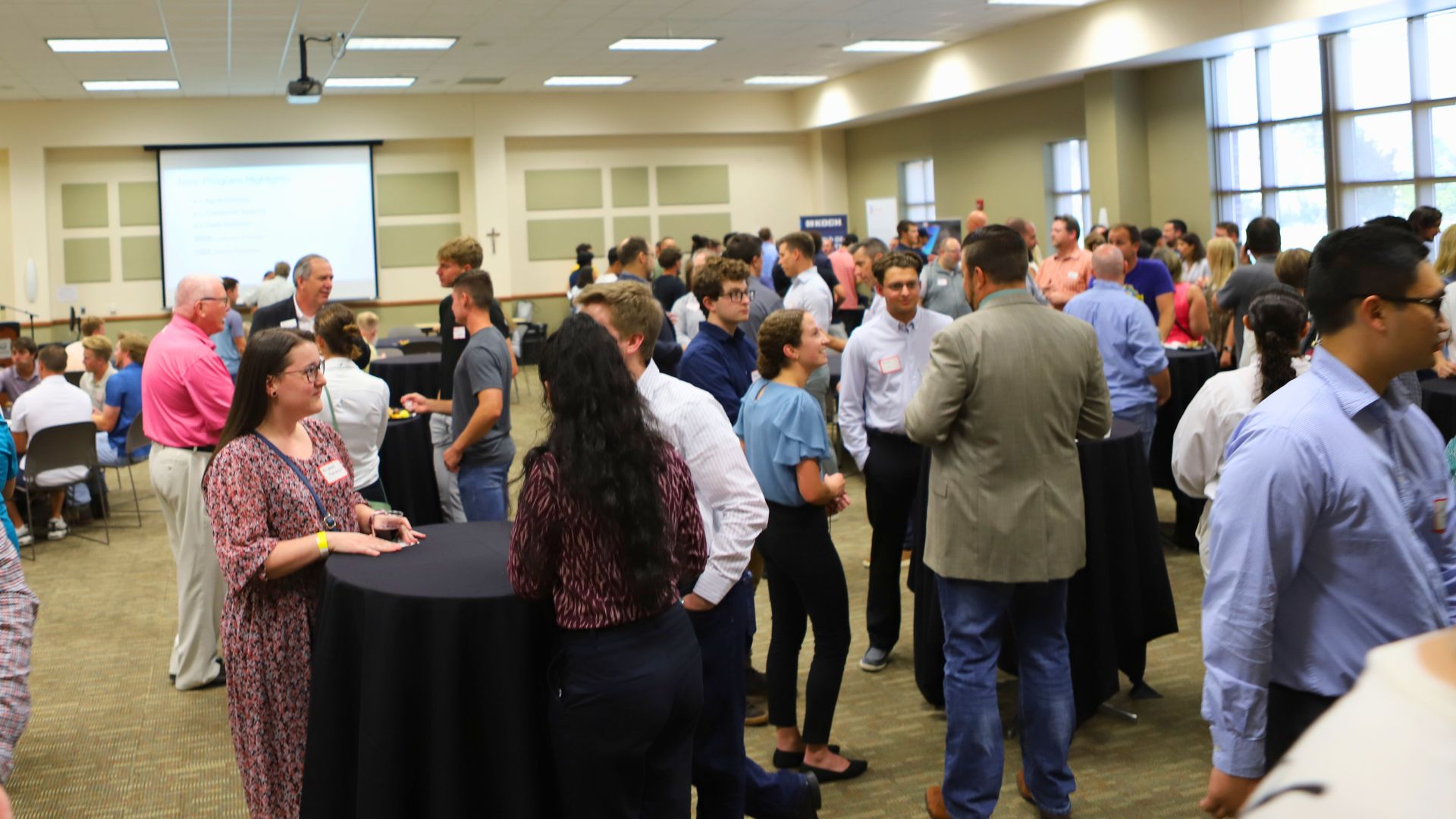 Students and employers network during an event at Newman University.