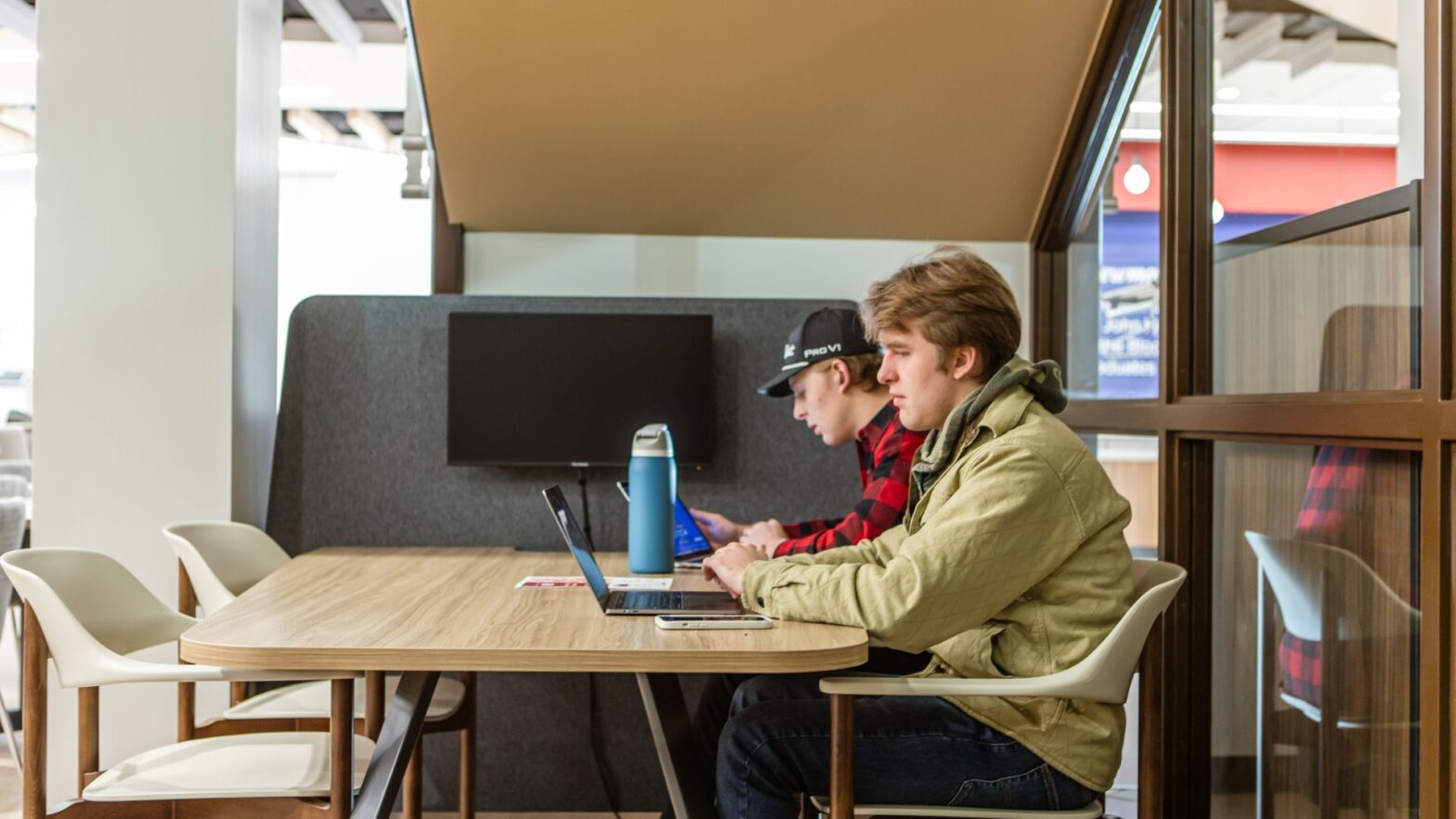 Students study at a table in the Student Success Center.