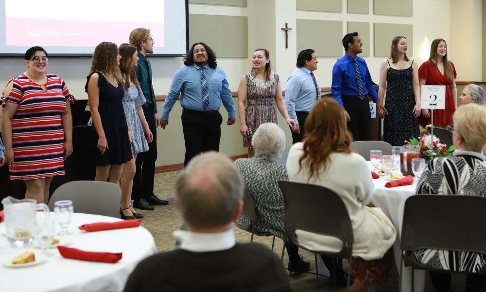 Newman Troubadours provide entertainment at Scholarship Luncheon