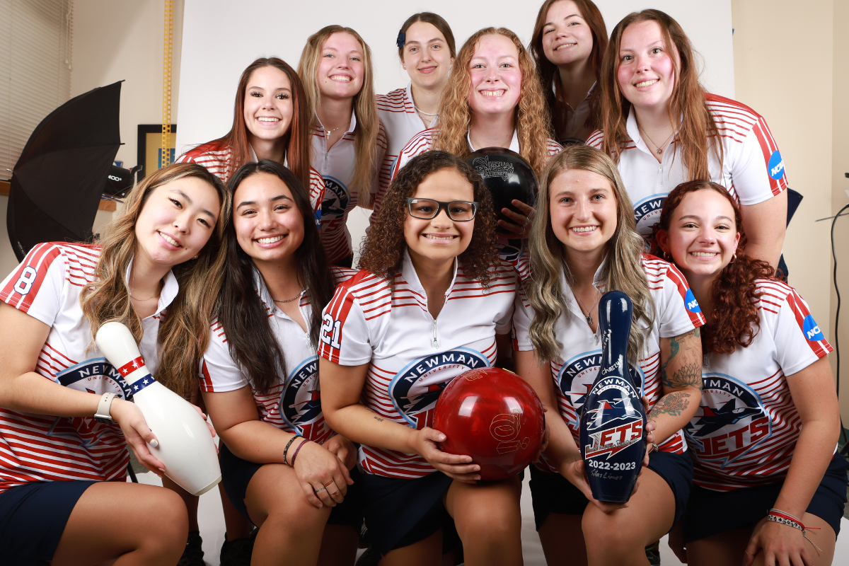 Newman's women bowling team smiling