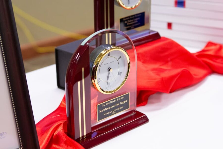 A crystal clock award for donors of the Sacred Heart Society