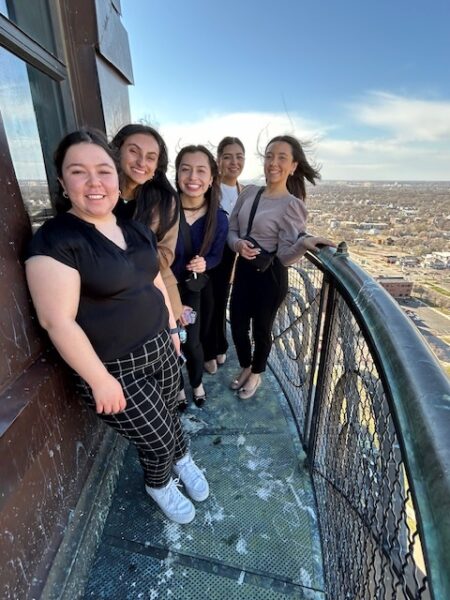 The five students on the balcony of the Kansas State Capitol building.