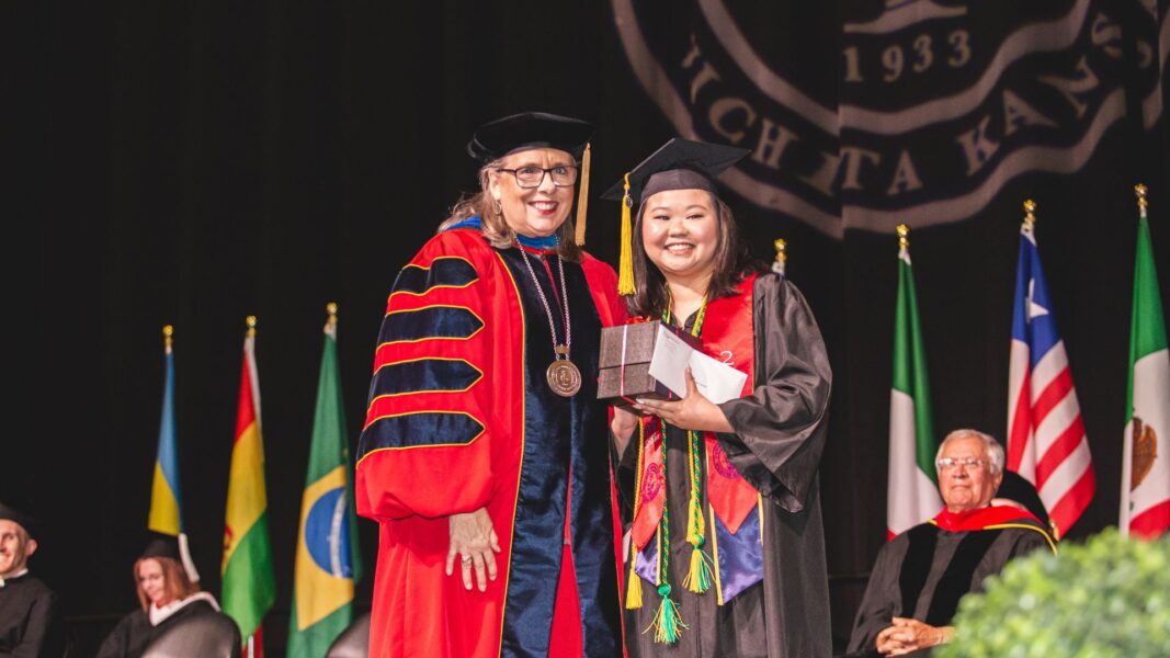 Newman University President Kathleen Jagger, Ph.D., MPH, awards Ashley Dinh the 2024 Leona J. Ablah Award.