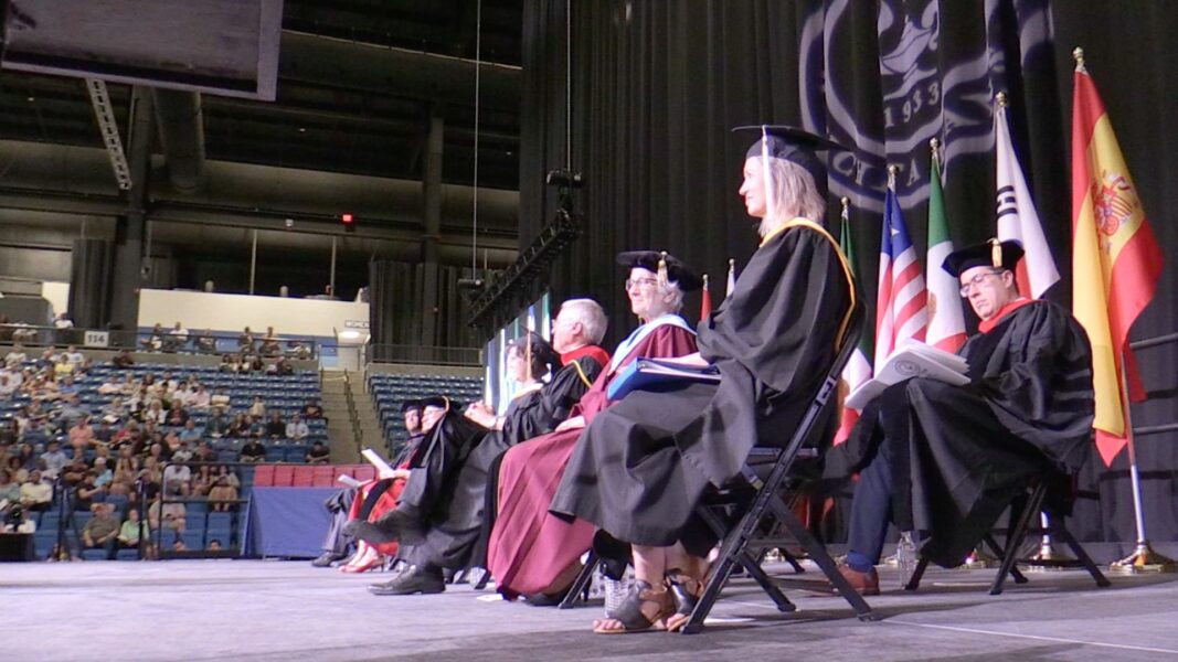 Bontrager sits on stage during the 2024 commencement ceremony.
